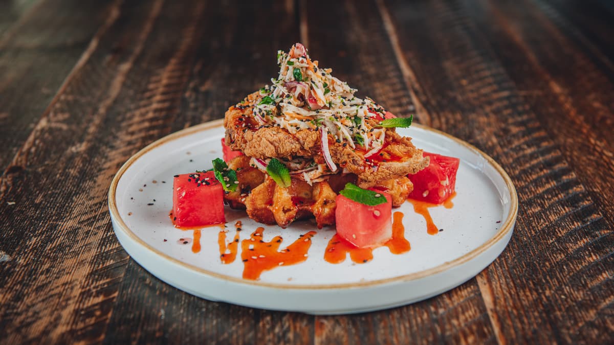 Fried chicken, waffles and watermelon on one plate only at The